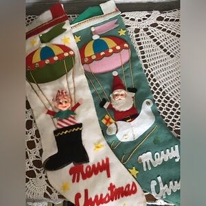 Vintage Colorful Christmas Stockings with Santa and Elf in hot air ballon